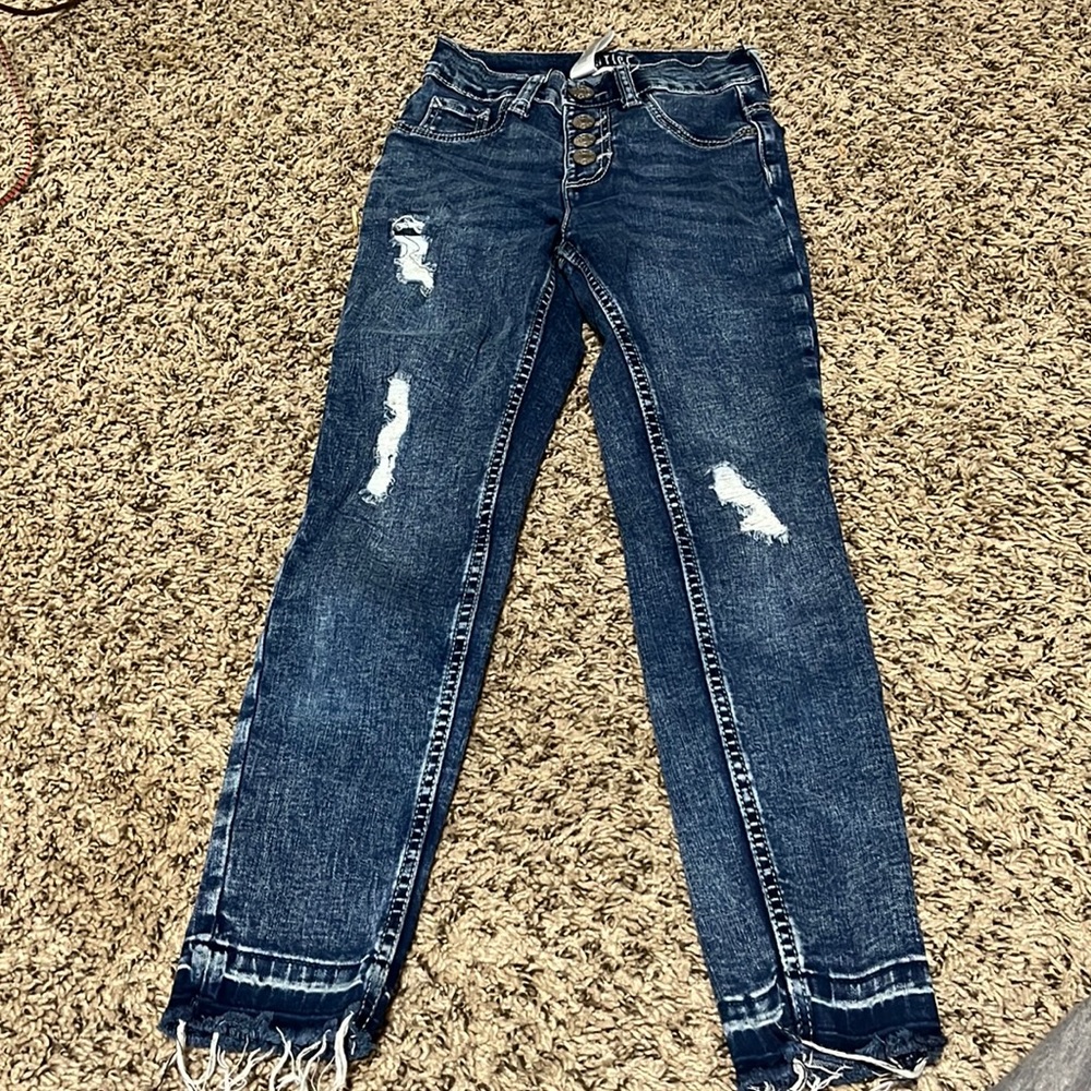 Blue ripped jeans